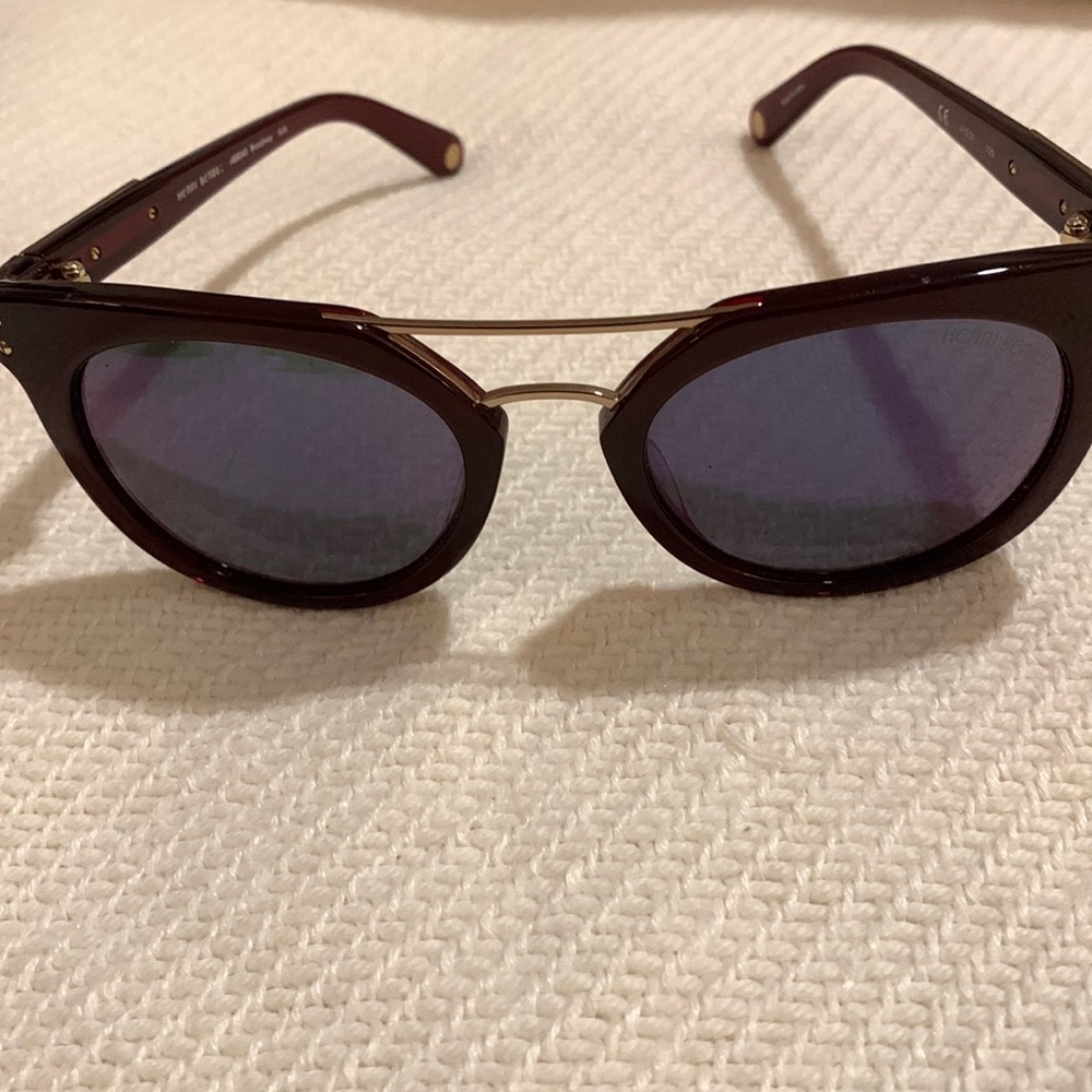 Henri Bendel Maroon Frame with Metal Accents. Has Original Cloth Bag and Case